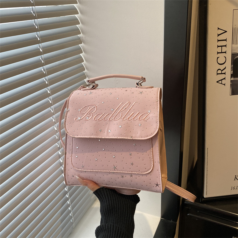 Mochila de moda coreana 2026 nuevo estilo coreano estilo académico letras versátiles bolso de hombro de mano