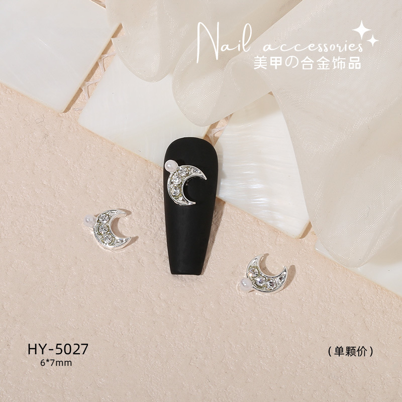 Nuevo arco de uñas amor aleación decoración de uñas flor de la luna mariposa clavo taladro fábrica joyería al por mayor