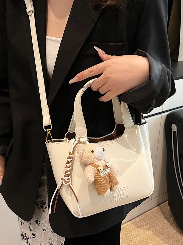 Vintage Maillard bolso de mano para mujeres 2025 nuevo estilo transfronterizo popular aceite cera cuero bolso de cubo textura mochila