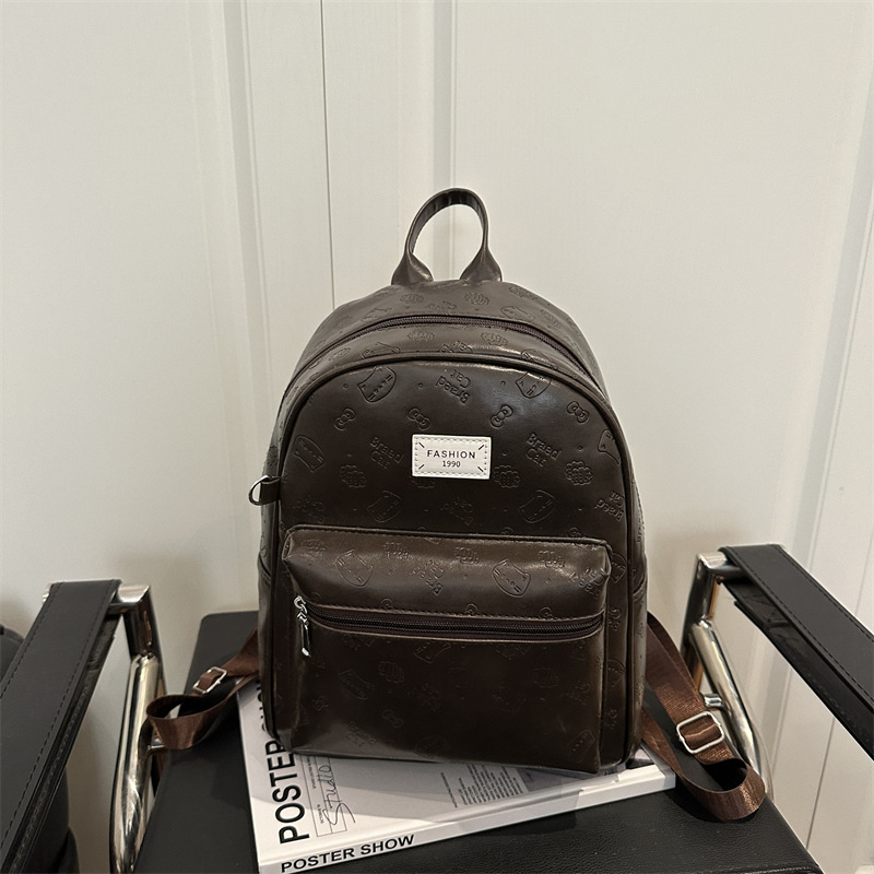 Mochila de nicho coreano para mujeres 2025 nueva moda retro ocio versátil mochila de viaje de estudiantes