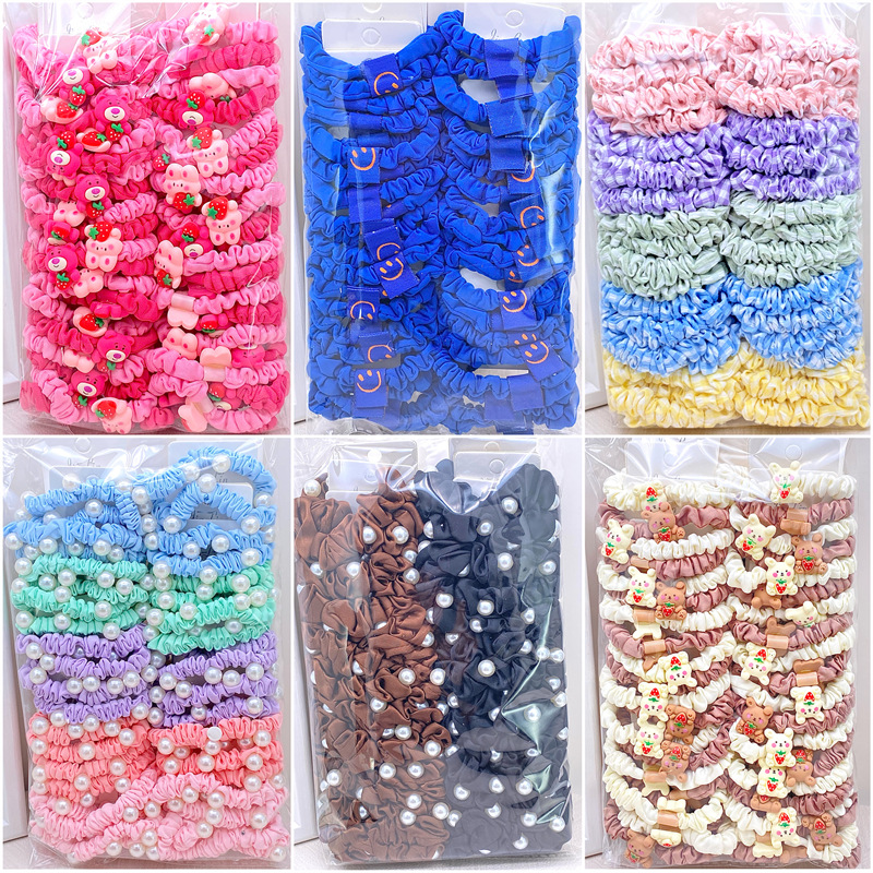 Tarjeta banda de pelo de las mujeres corbata de pelo Oso de dibujos animados intestino grueso banda de goma cabeza cuerda tienda física dos yuanes tienda accesorios para el cabello accesorios para la cabeza