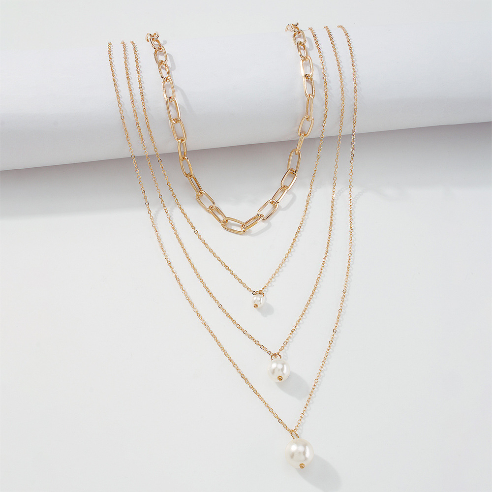 Retro Multi-layered Wearing Temperament Necklace Imitation Pearl Chain Niche Exaggerated Necklace display picture 6