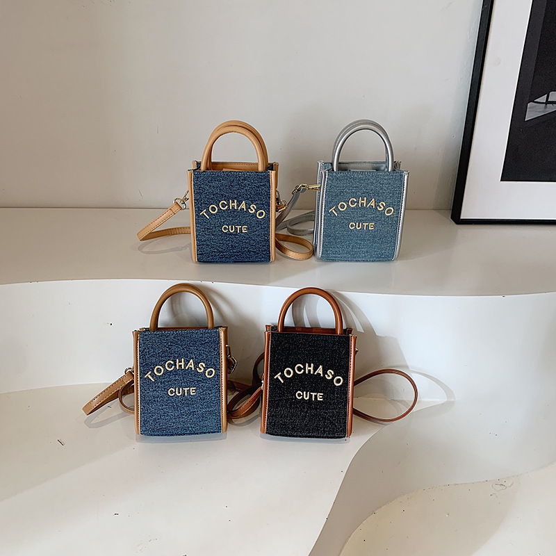 Bolsas de estilo coreano para niños y niñas letras extranjeras estilo mini bolsas de mochila para bebés 2025 nuevas bolsas de comercio exterior para niños