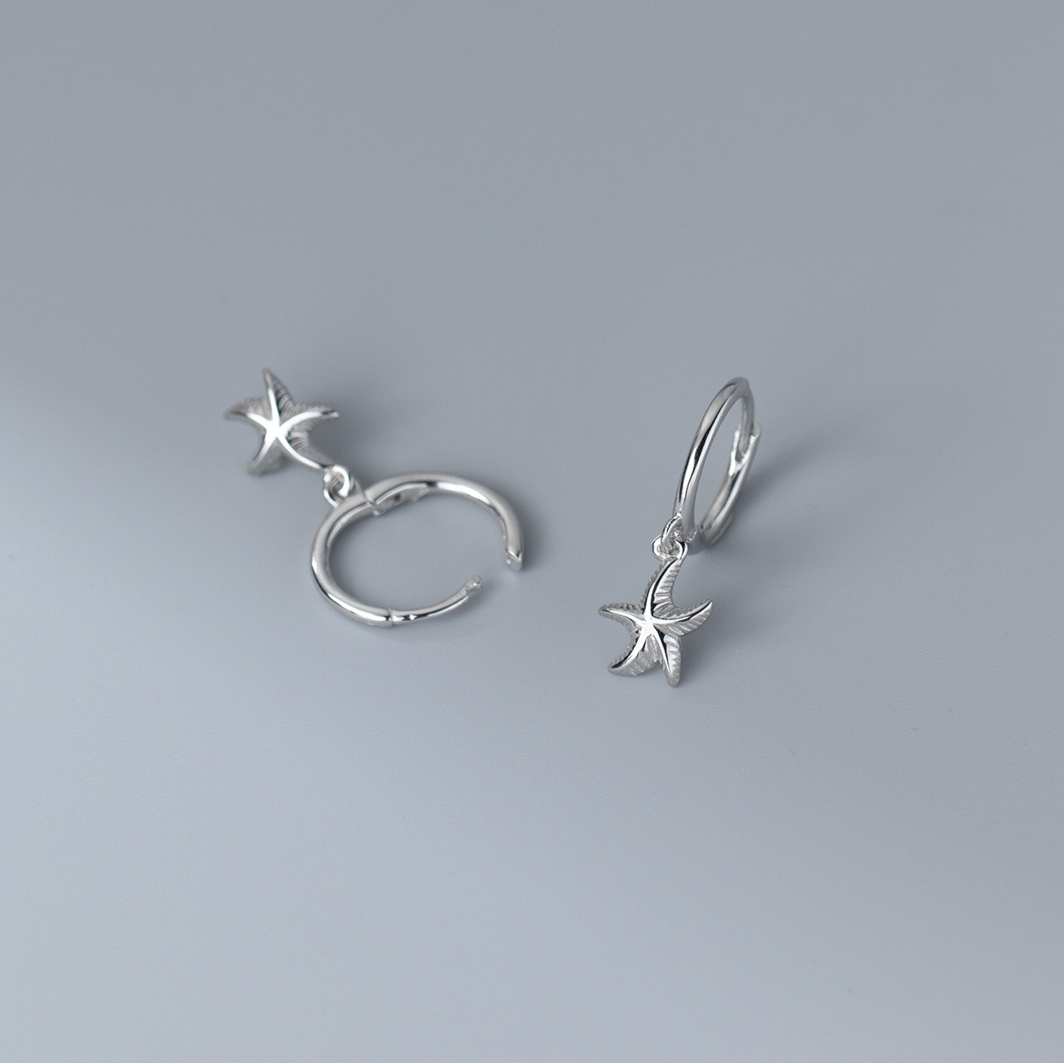 Eloch s925 plata elementos marinos simplista dulce estrella de mar auriculares frescos japoneses y coreanos auriculares mujeres M01211