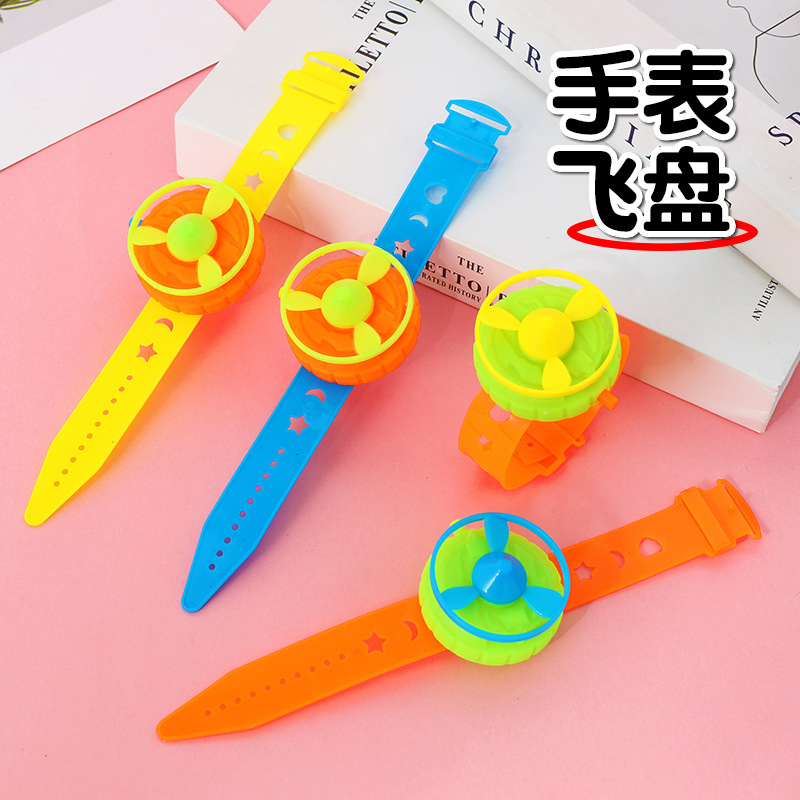 Bambú libélula relojes Frisbee platillos voladores juguetes al aire libre Flying Skyfly pulsera lanzador giroscopio giratorio de catapulta