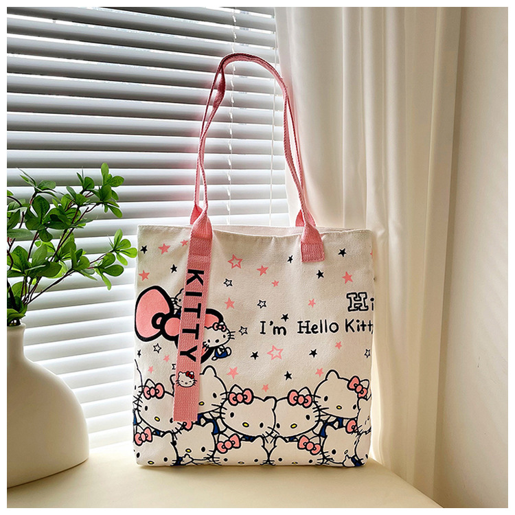 The new fashionable cartoon canvas bag, simple and versatile tote bag, cute commuting single-shoulder tote large bag, is selling well across borders undefined