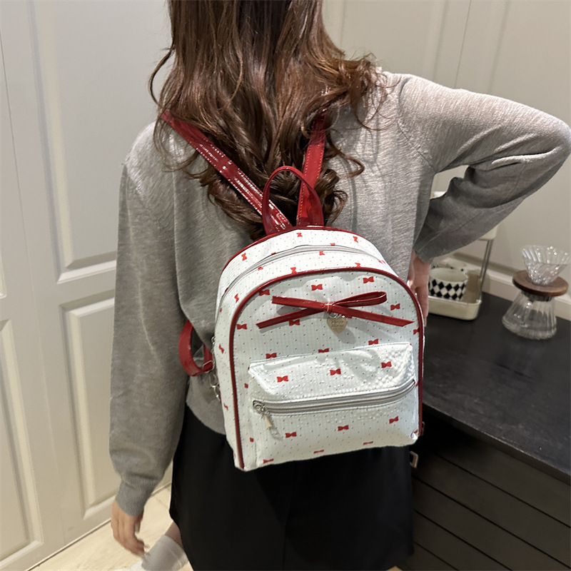 Bolsa de hombro de estilo académico coreano para mujeres 2026 nueva moda de verano mochila de arco pequeña bolsa de compras