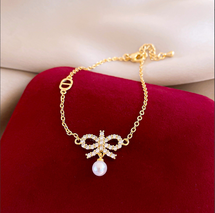 Pulsera de amor solar de circón galvanizado en oro real