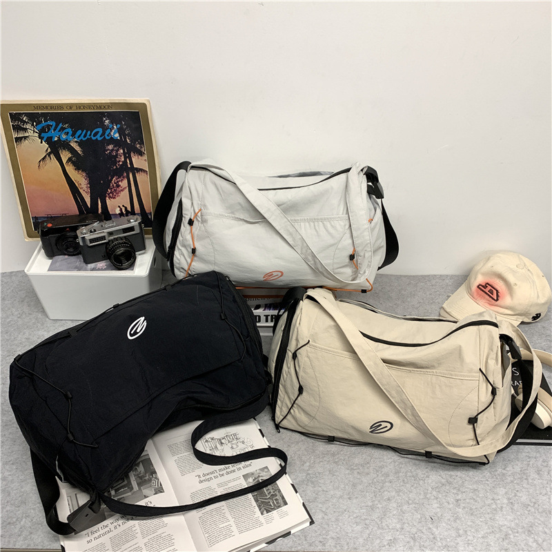 Bolsa de viaje de gran capacidad de verano 2025 nuevo viaje corto de acondicionamiento físico viaje de negocios bolsa de mano impermeable