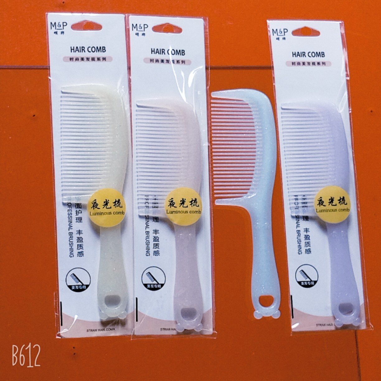 Bonito peine de peinado color macarrón con cojín de aire para masaje, adecuado para uso doméstico y dormitorios estudiantiles, cepillo de pelo de plástico suave con cojín de aire.
