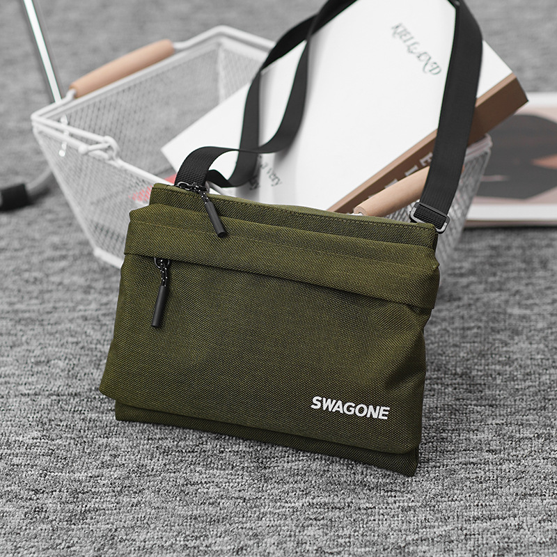 簡約休閒運動小包包女款2024春季新款百搭通用男單肩斜挎包小方包