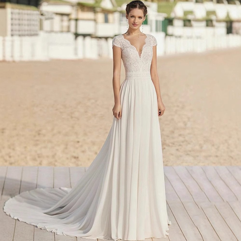 Europa y América simple vestido de novia ligero 2025 nuevo paquete de hombro delgado gran espalda de la novia de cola para salir a la foto