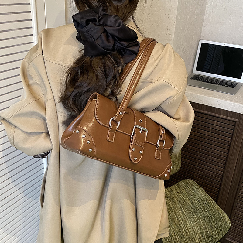 Nicho transfronterizo bolso de locomotora retro mujer otoño / invierno 2025 nuevo estilo de moda bolso de hombro de brazo bolso de viaje