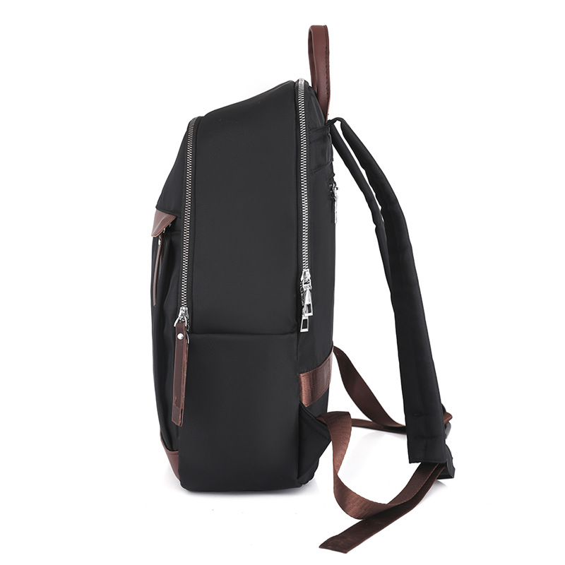 Fábrica al por mayor 2023 nueva mochila de tela Oxford para mujer retro casual de gran capacidad de 14 pulgadas para mujer