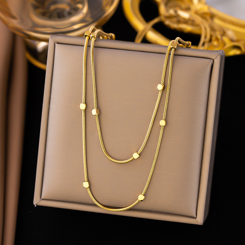 Collar al por mayor transfronterizo de las mujeres que no se desvanece elegante de lujo exquisito Acero de titanio nuevo nicho de las mujeres cadena de la clavícula de la moda del todo fósforo