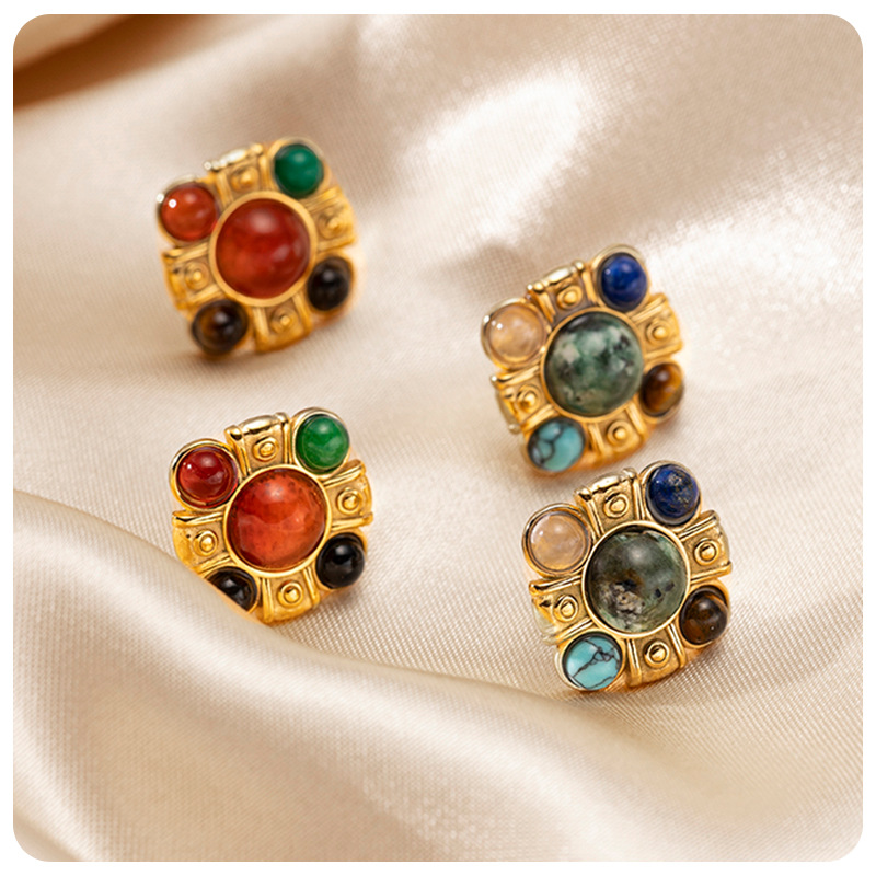 Tiana estilo medieval retro color natural piedra medieval orejas de alta sensación pendientes nicho retro aretes de corte