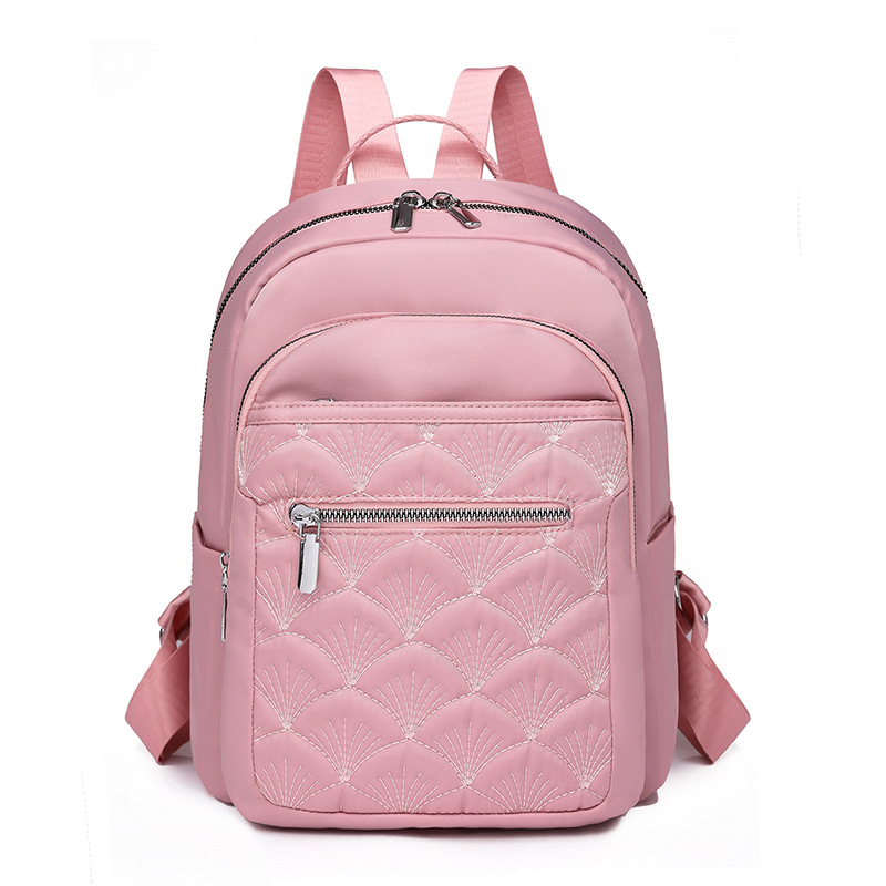2024 nueva mochila de nylon bordada casual para mujer simple y ligera mochila de viaje de viaje urbano mochila escolar de moda