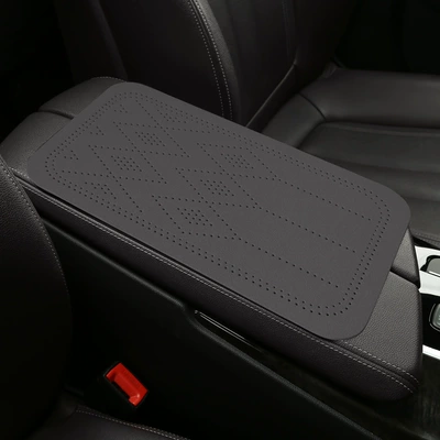 Armrest box pad, diamond-shaped perforations, universal central