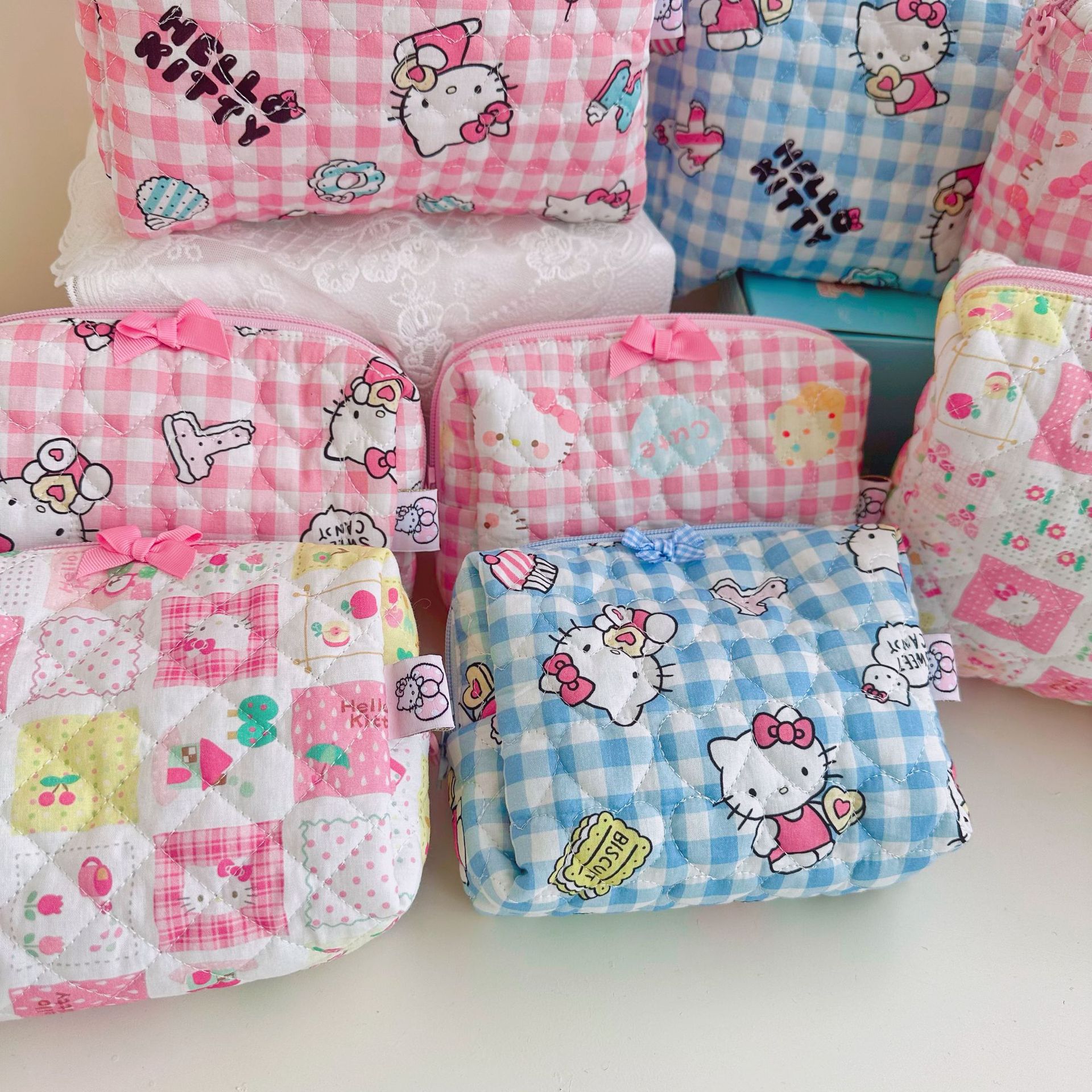 キルティング刺繍綿布芸アニメかわいいKT少女口紅化粧品収納バッグ化粧バッグ手作りバッグ卸売り