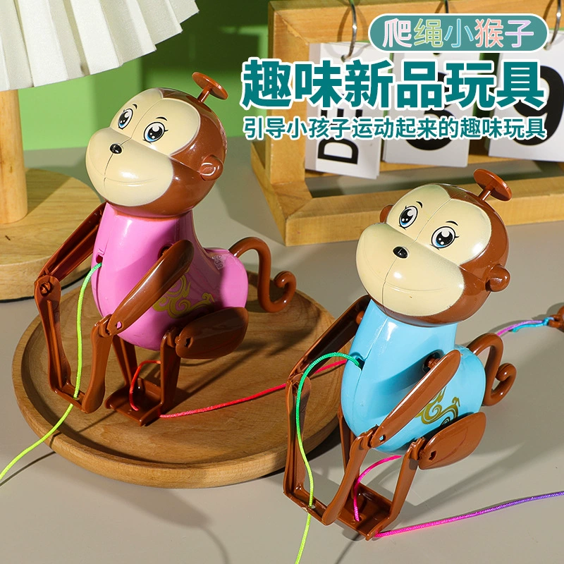 Творческая партия тянет на веревку Обезьяна, ребенок забавная игрушка, тянуть веревку, маленькая обезьяна, киоск ночной рынок оптом