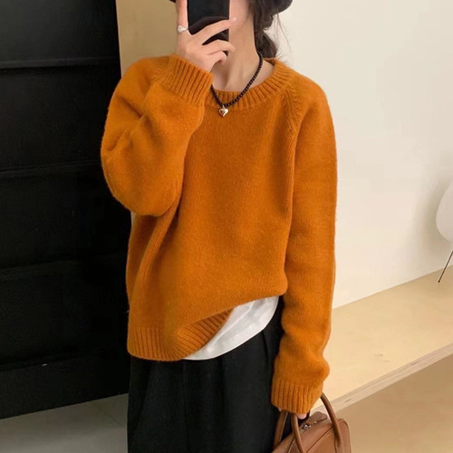 Stylish women's oversized cozy winter round neck simple solid color Korean style knit top for a loose and slimming fit