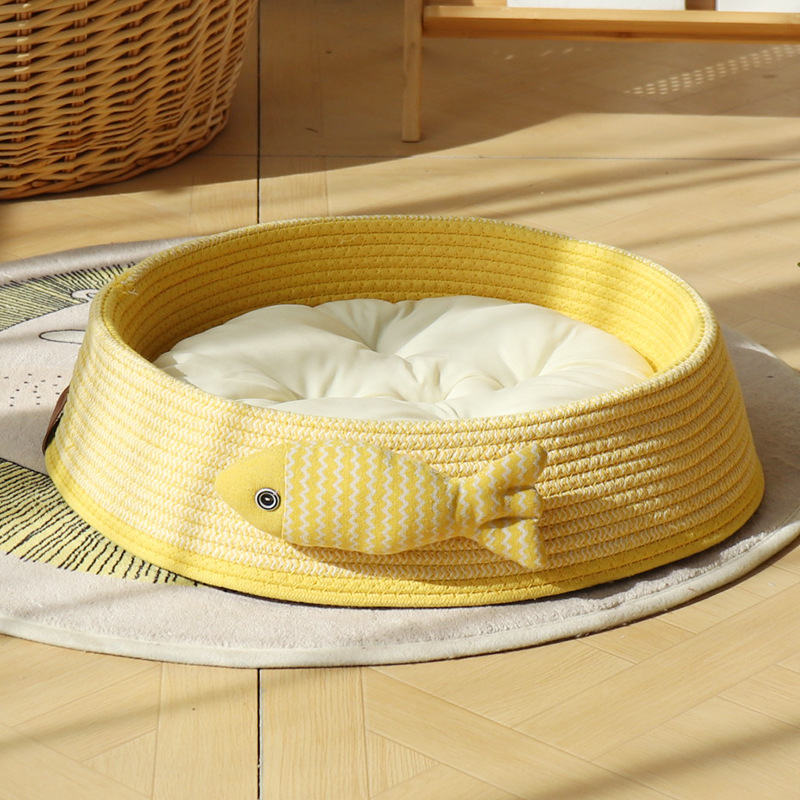 접힌 골판지 노란색 + 작은 물고기 + 흰색 면 패드