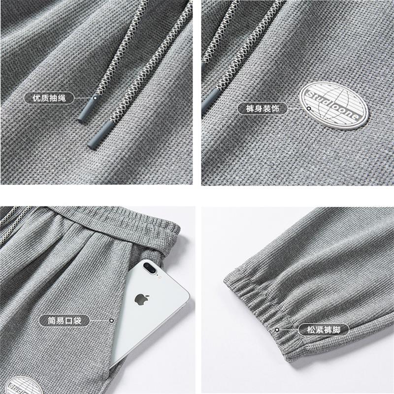 Pantalones casuales forrados de lana de los hombres de otoño e invierno deportes ins moda niños tobillo-atado suelta más tamaño waffle Pantalones