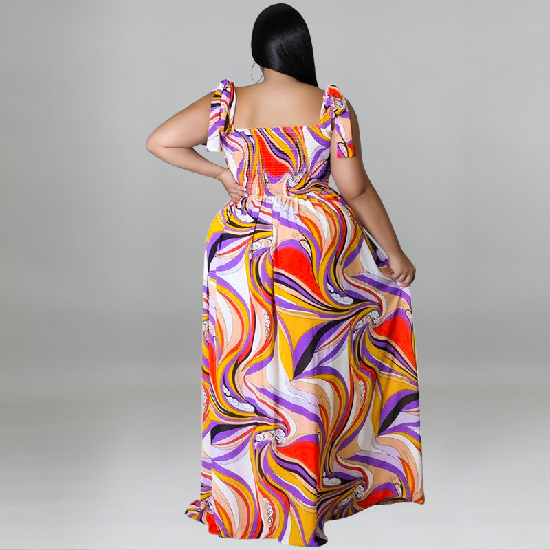 Maxi jurk met spaghettibandjes en smockwerk en strikprint_voghion.com