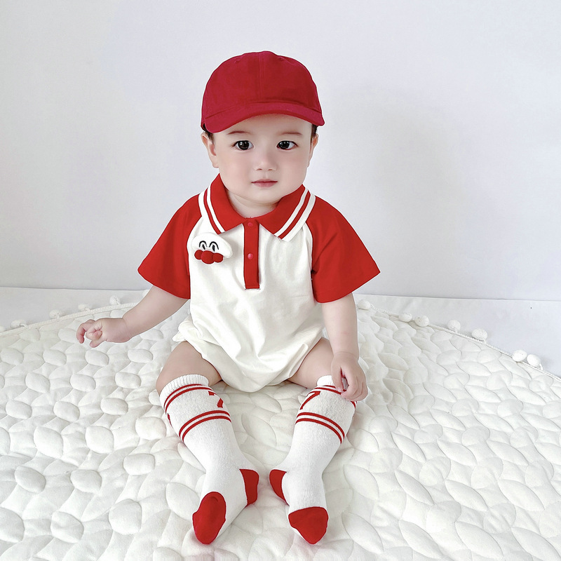 Bebé verano nuevo mono estilo coreano niños y niñas casual deportes estilo solapa rojo y blanco costura dibujos animados vaina