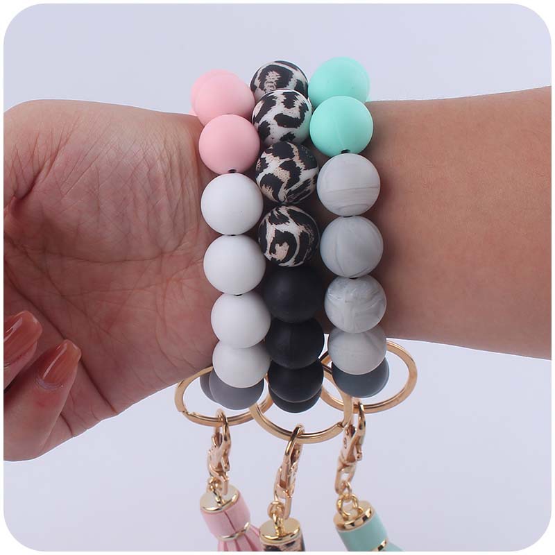 Creativo nuevo cuero pu borla colgante llavero silicona muñeca leopardo silicona pulsera llavero