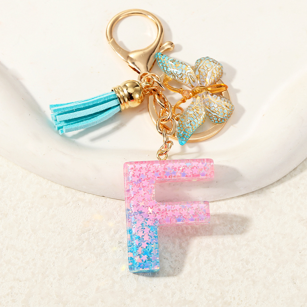 Europa y los Estados Unidos transfronterizos nuevos cristal sequinado goteo de goma letras inglesas joyería llavero y bolsos colgante apoyo al por mayor