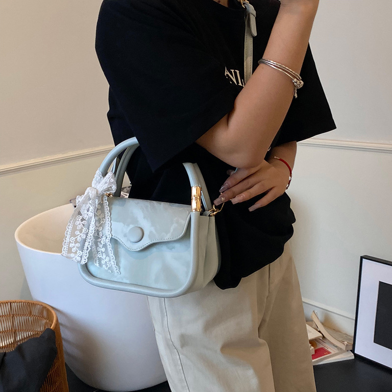 Bolso cuadrado pequeño de mano de estilo occidental de moda para mujer 2025 nuevo bolso de hombro casual de todo fósforo bolso de mensajero de alta calidad transfronterizo