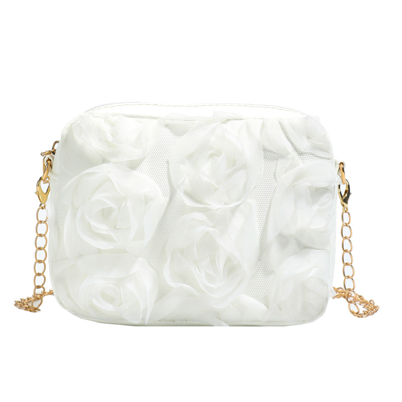 Nuevos accesorios para niños coreanos bolsos de encaje dulce flor tridimensional bolsos de mano frescos bolsos pequeños para hombres y mujeres