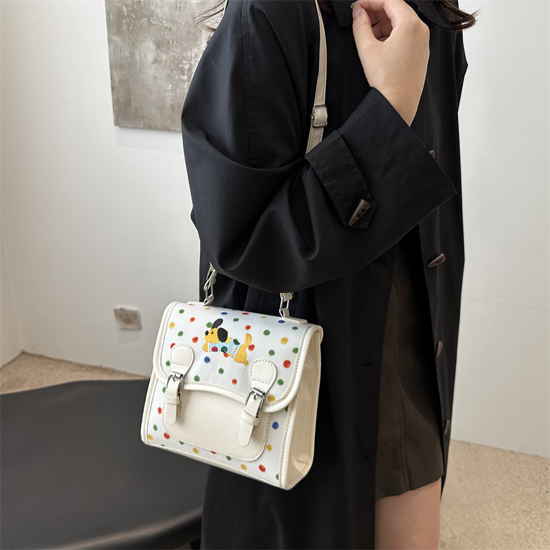 Bolso popular de mujer 2024 nuevo tipo de mochila, mochila de punto de onda, mochila de gran capacidad, mochila multifuncional