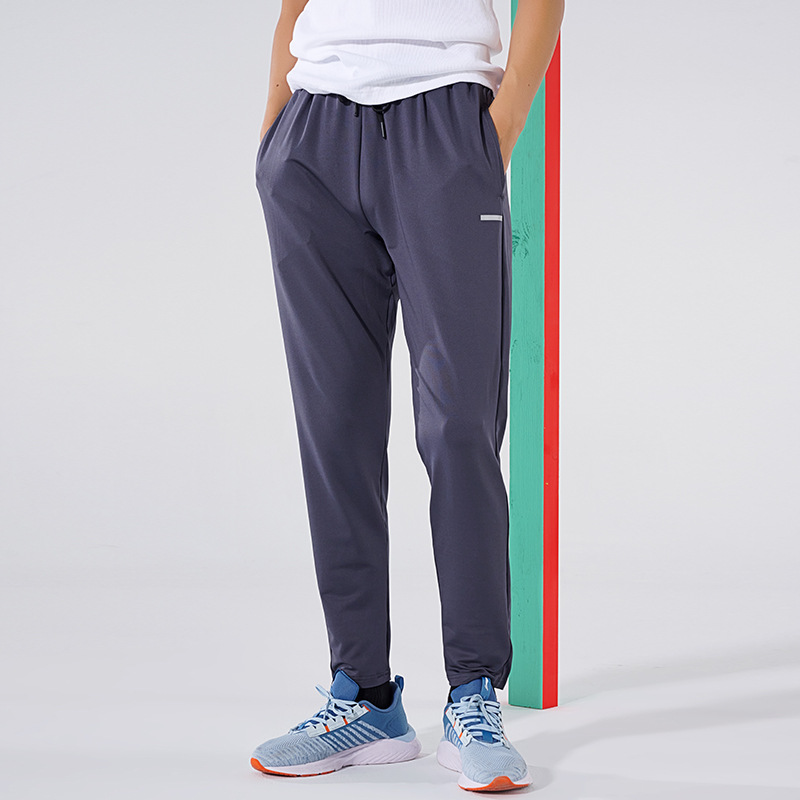 Primavera y otoño de los hombres al aire libre corriendo Pantalones deportivos de secado rápido transpirable flojo más tamaño casual estiramiento pantalones en stock impreso NK