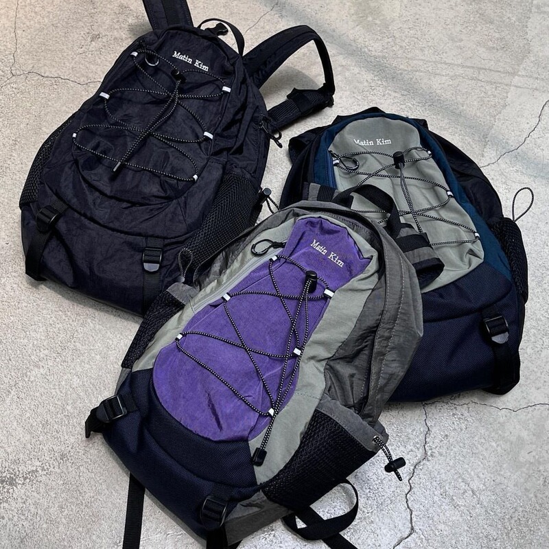 matin kim South Korea designer brand 23 summer new sports drawstring stitching practical backpack