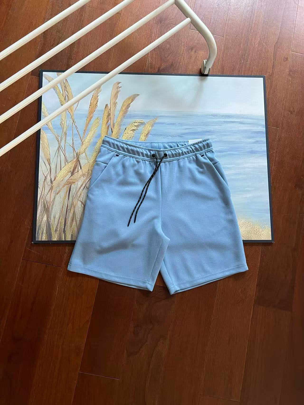 Verano nuevo estilo pequeño gancho versión en el extranjero de doce colores pantalones cortos deportivos de punto de pegamento lateral para hombres pantalones de cinco puntos 4503