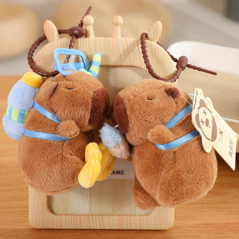 Fábrica de stock al por mayor de la nariz genuina osos muñecas de peluche colgantes capibara muñecas bolsas colgantes