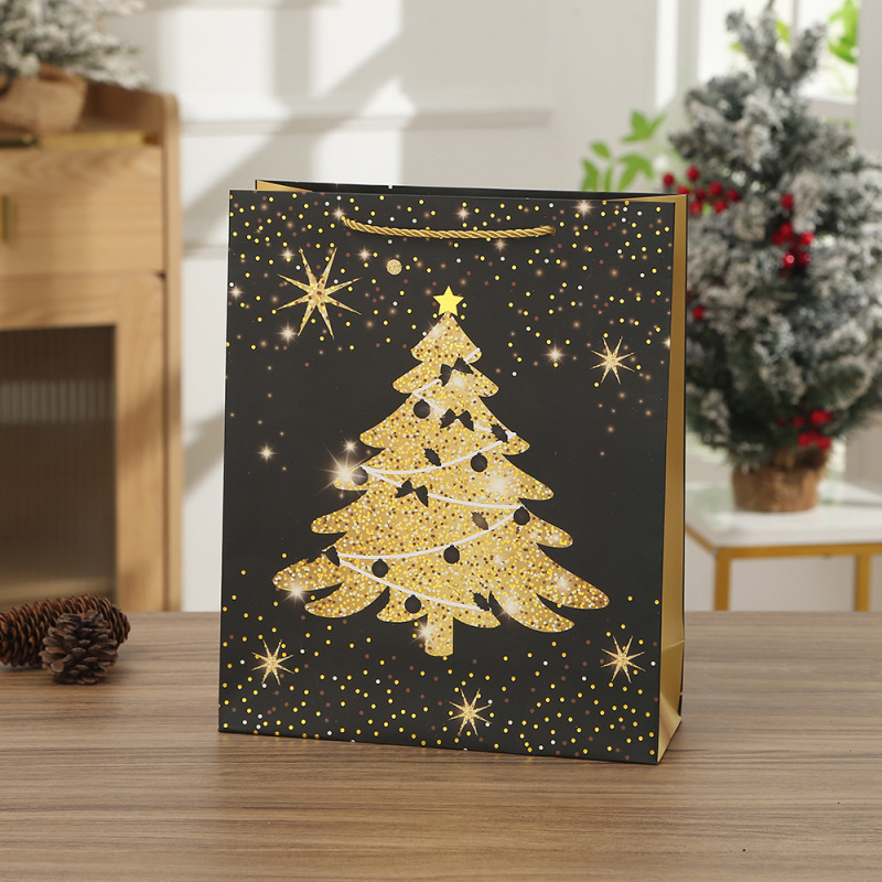 黒金のテーマのギフトバッグのクリスマスは縄の手提げ袋のクリスマスイブのサプライズのプレゼント袋の手提げ袋のショッピングバッグを着ます。|undefined