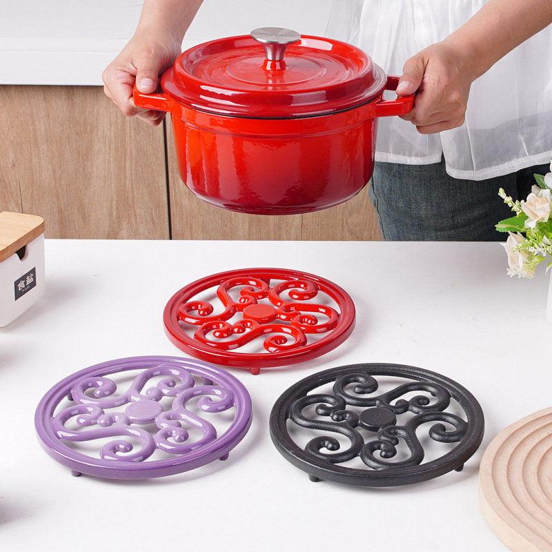 Cojín aislante de esmalte de hierro fundido nuevo cojín de mesa de comedor chino resistente a quemaduras cojín de platos resistente a altas temperaturas