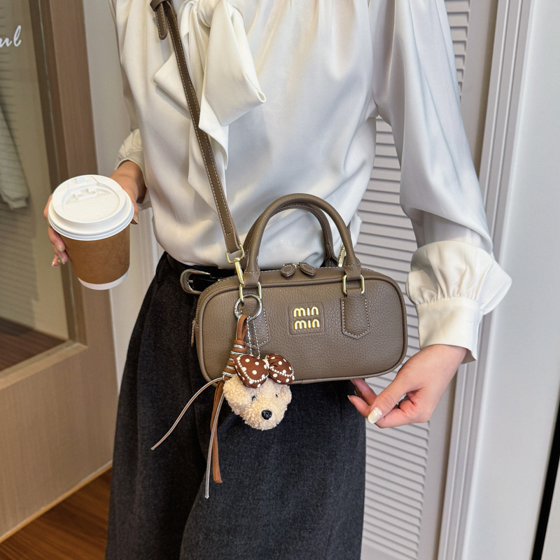 Bolsa de bolos portátil retro para mujeres 2026 nueva moda diaria sensación de bolso cuadrado bolso de hombro universal