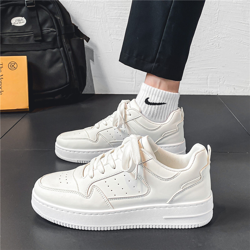 Zapatos de skate para hombres primavera nuevos zapatos de cuero transpirables deportivos casuales para hombres moda juvenil con suela gruesa zapatos blancos para hombres