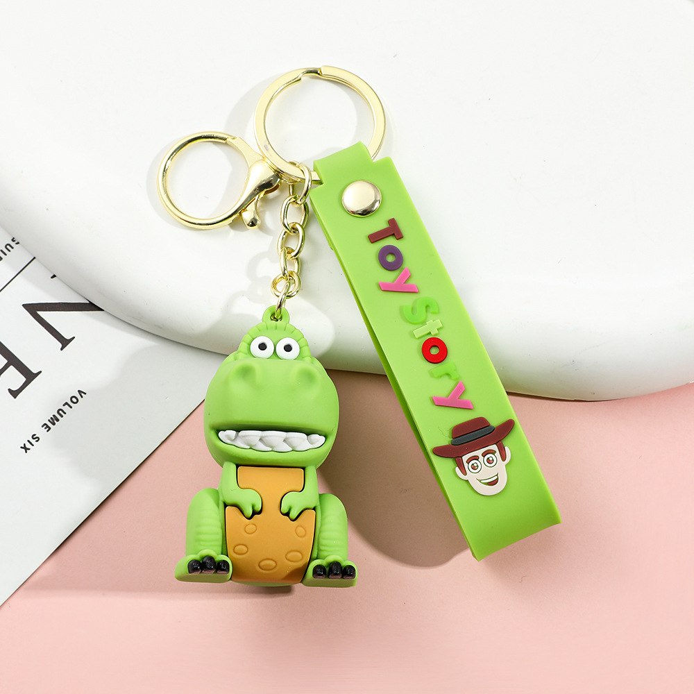 Llavero de silicona de Toy Story, el popular dibujo animado, con personajes como el alienígena de tres ojos, Buzz Lightyear y el oso Lotso, ideal como adorno para bolso.