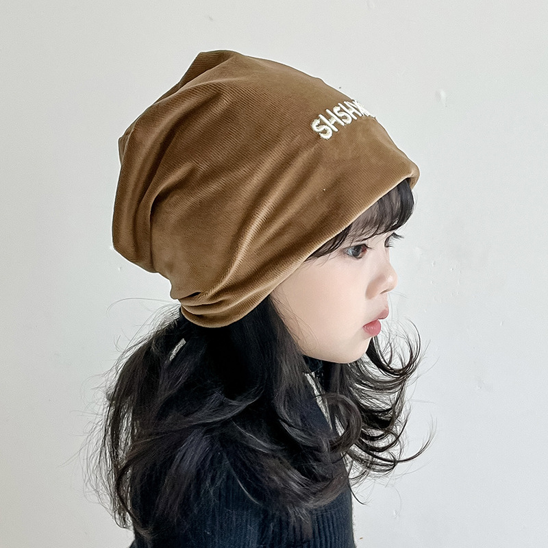 Hombres y niñas sombreros de moda de otoño de algodón húmedo para niños estilo extranjero sombreros de pila de estilo jardín de infantes negros a prueba de viento orejas