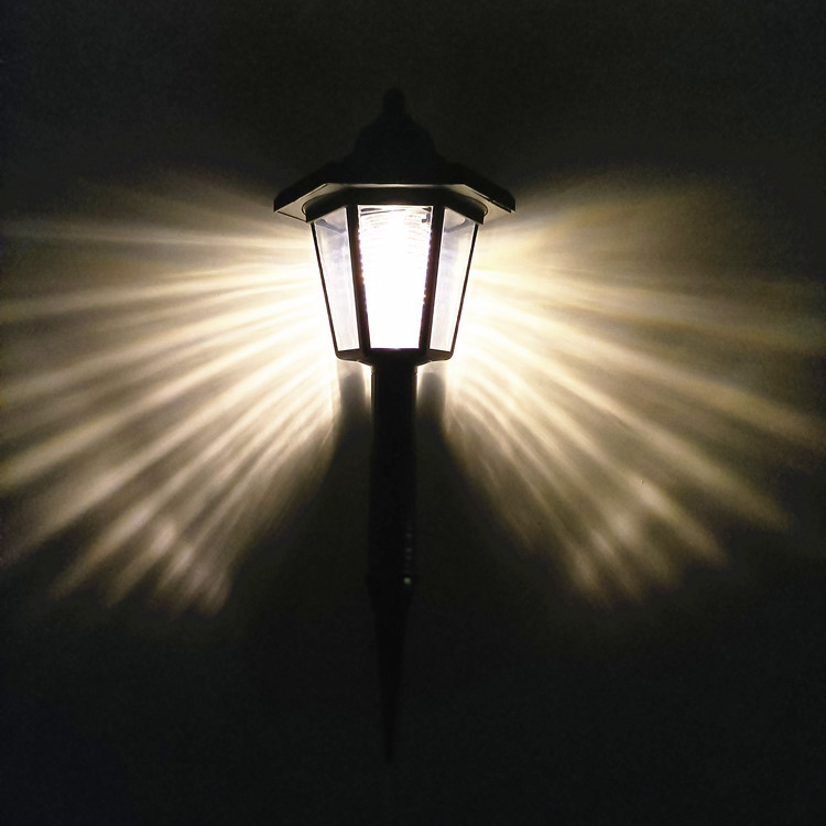 Fábrica suministra luz solar LED de pared de inducción césped patio villa decoración hexagonal paisaje jardín luz exterior