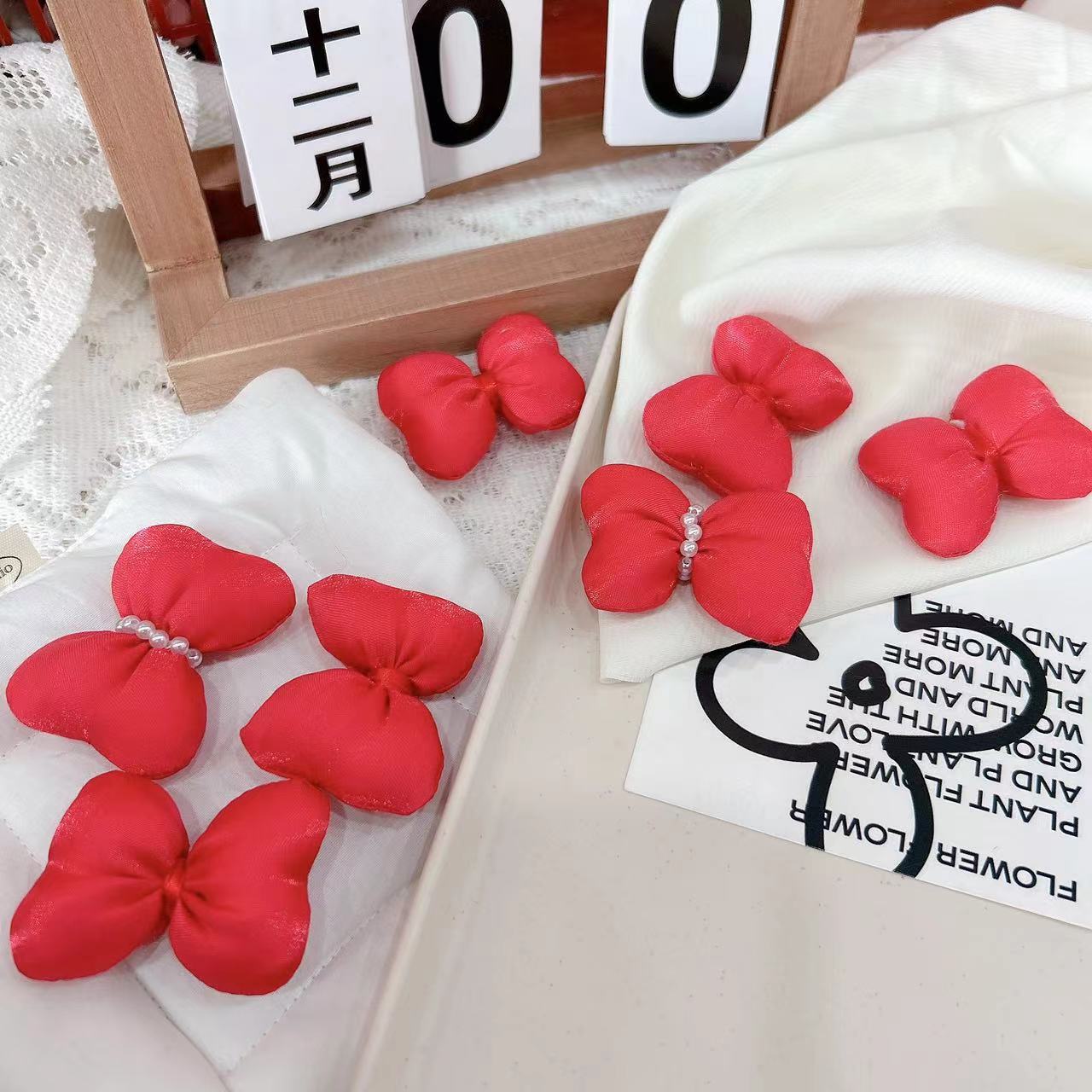 亮絲棉珍珠枕頭可愛充棉蝴蝶結服飾頭飾輔料箱包鞋襪配飾廠家批發