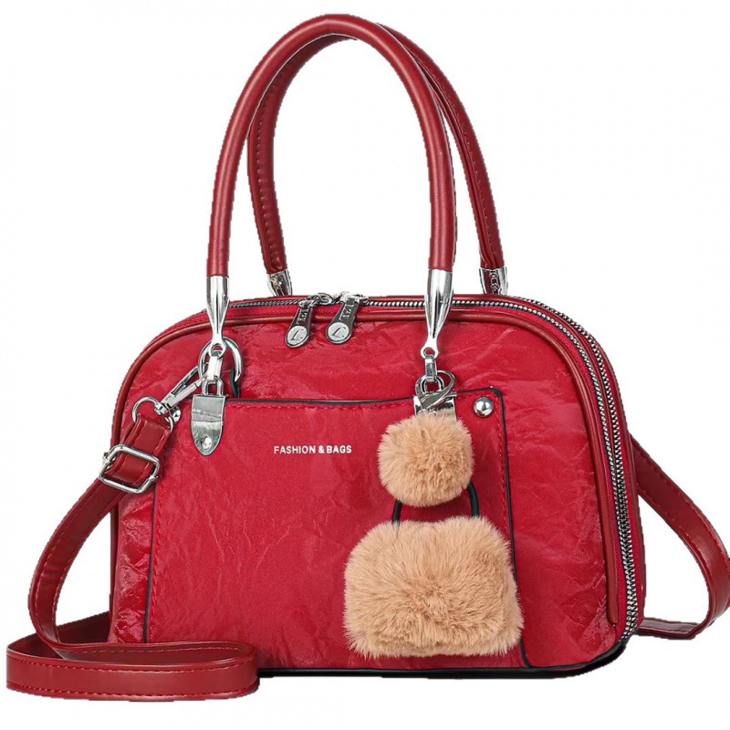 Muñeca decoración bolsos de mano bolsos de mujer moda versátil bolsos de hombro de tendencia casual bolsos cross-border