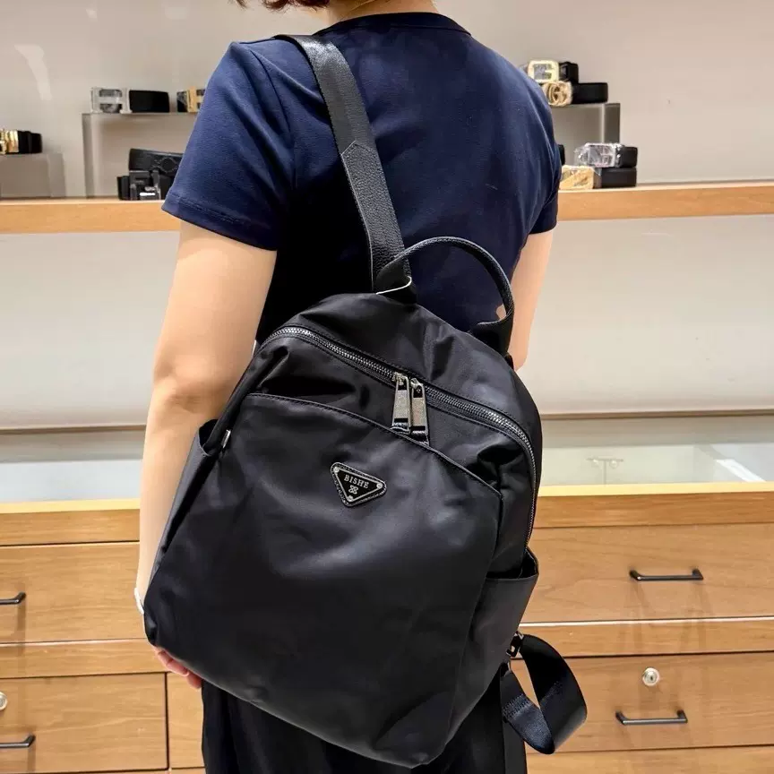 新款真皮包包百搭尼龙布旅行包轻便双肩包女包休闲通勤出行双背包