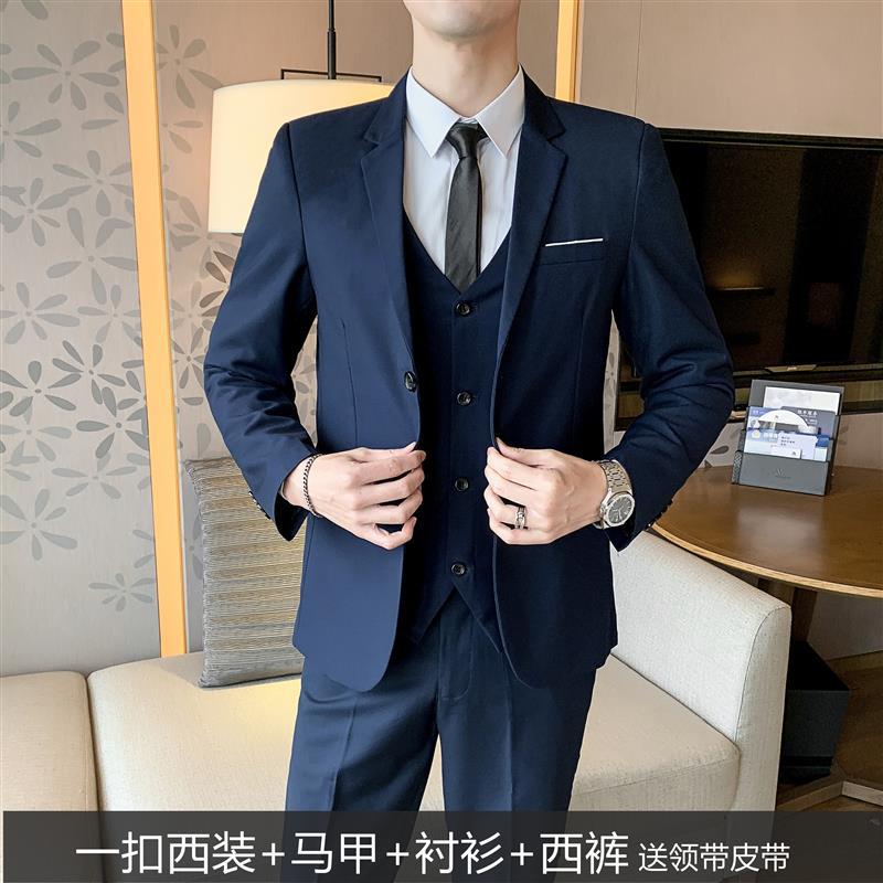 Traje azul marino de un botón + camisa + chaleco + Pantalones de traje con cinturón de corbata