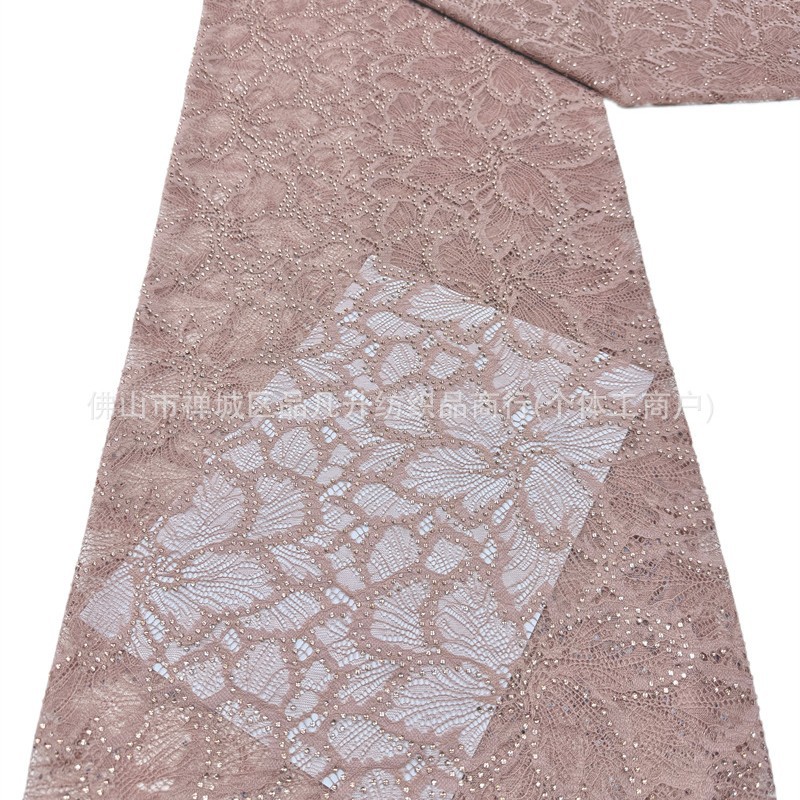Nuevo hueco flor de encaje fondo tela de perforación caliente pesada cola de pez vestido de boda vestido de noche brindis tela spot